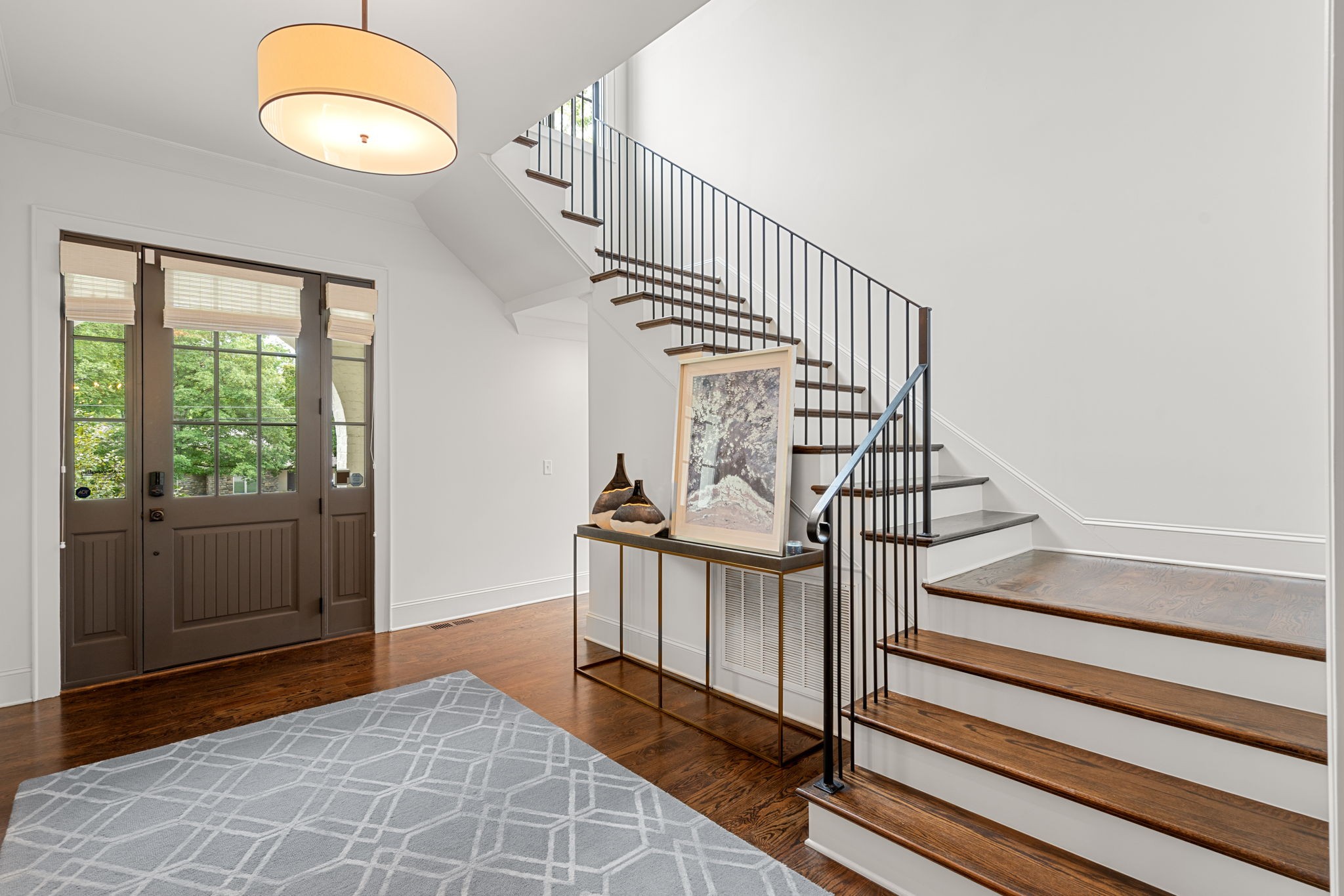 4031 Sneed Road Nashville, TN 37215 - Photo 6 of 61 a view of entryway and hall with wooden floor