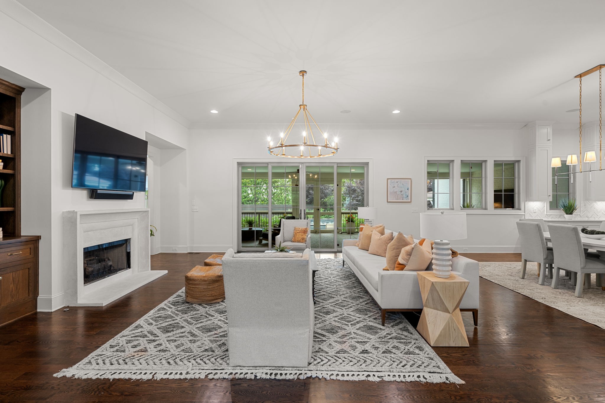 4031 Sneed Road Nashville, TN 37215 - Photo 7 of 61 a living room with fireplace furniture flat screen tv and wooden floor