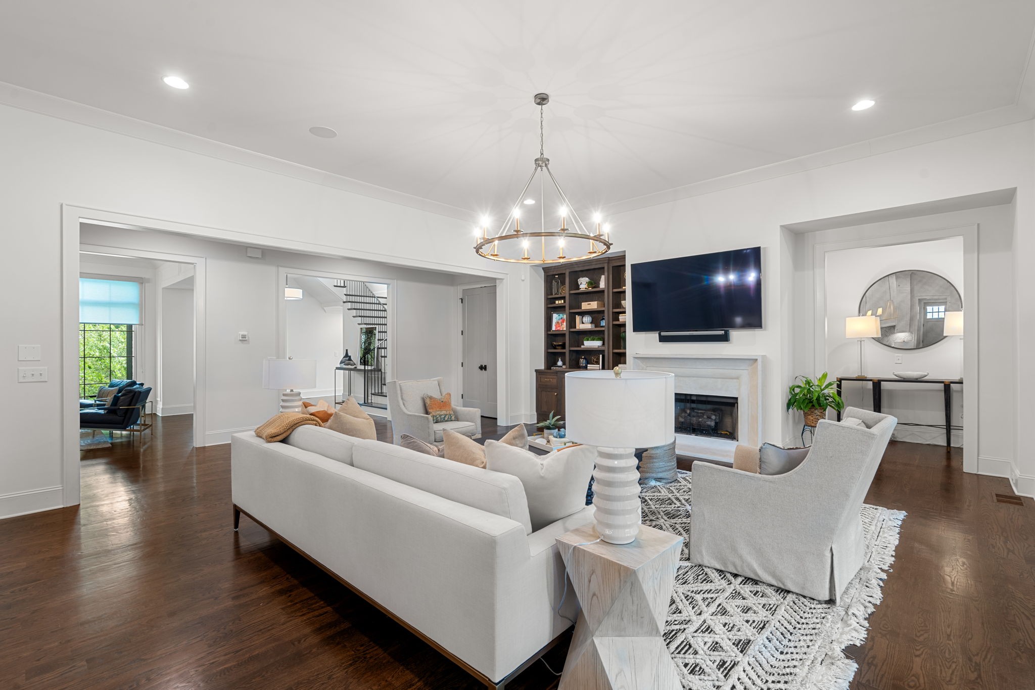 4031 Sneed Road Nashville, TN 37215 - Photo 9 of 61 a living room with furniture a fireplace and a flat screen tv