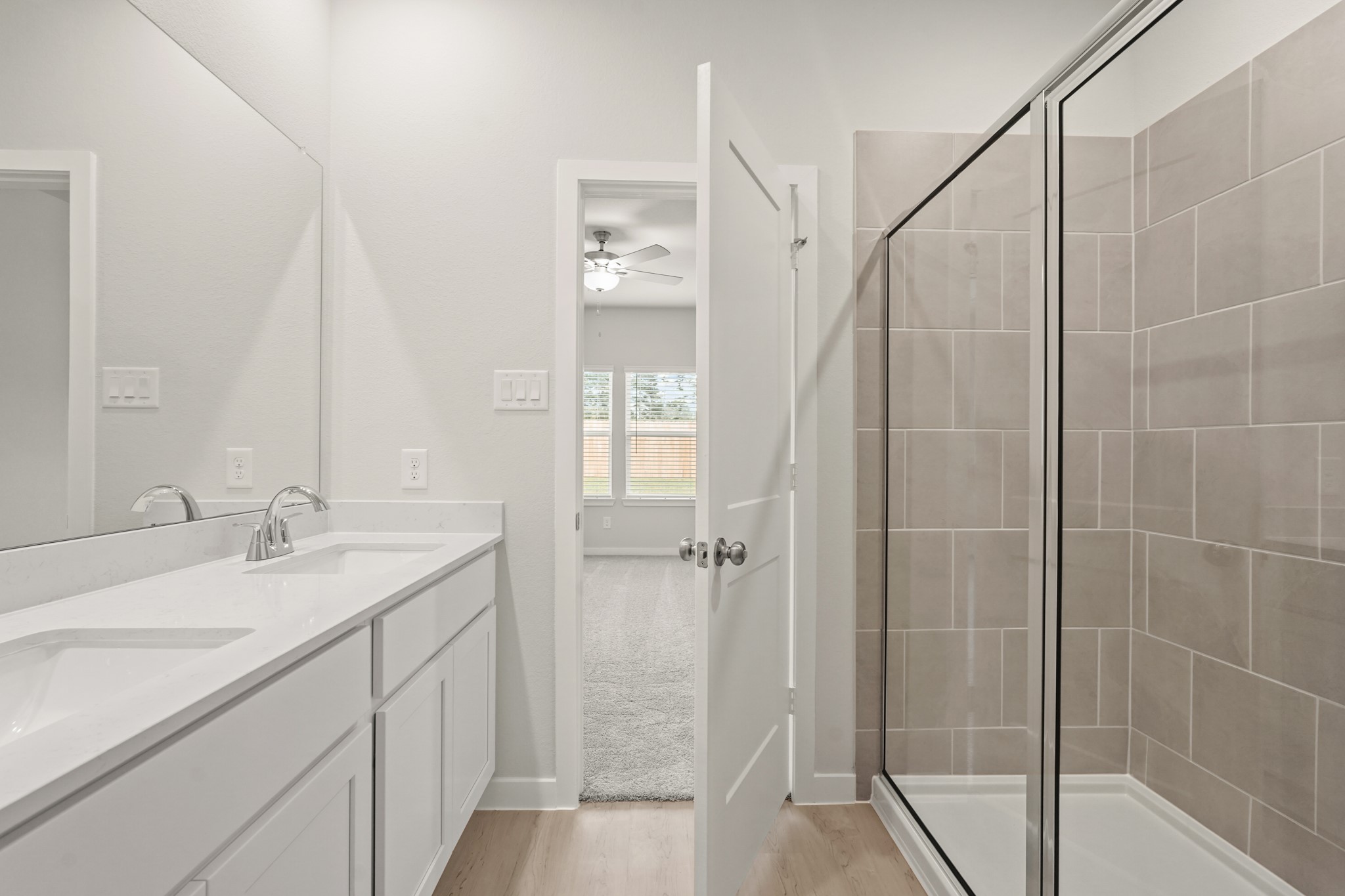 113 Rising Cedar Lane Hockley, TX 77447 - Photo 16 of 27 a bathroom with a shower and a sink
