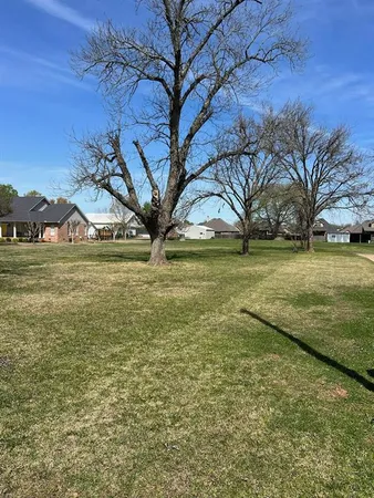 a view of yard with an outdoor space