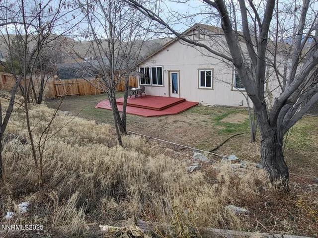 a view of backyard of house