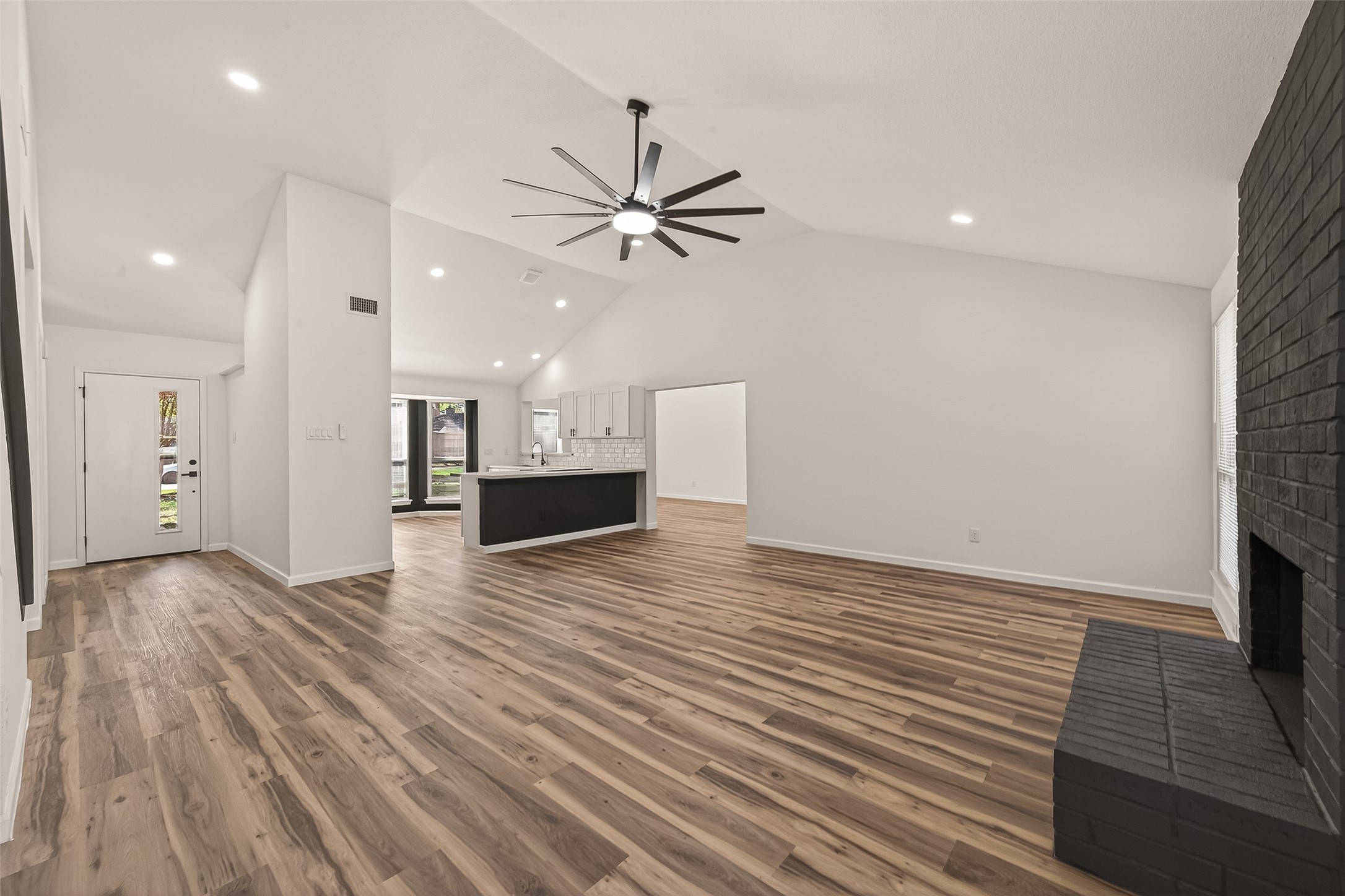 2915 Whispering Springs Drive Spring, TX 77373 - Photo 7 of 36 Bright and airy layout connecting living, dining, and kitchen—perfect for entertaining.