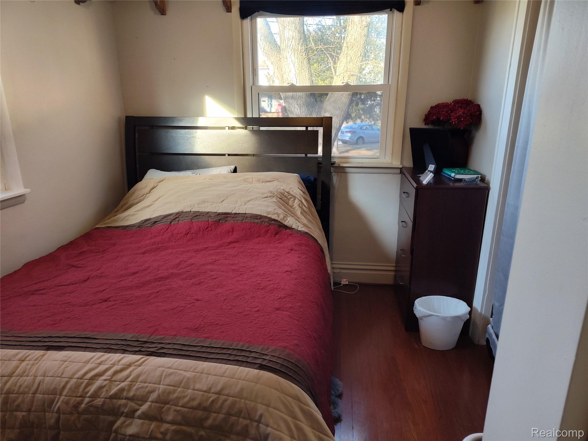 635 Laplaisance Road Monroe, MI 48161 - Photo 10 of 23 Bedroom with wood finished floors