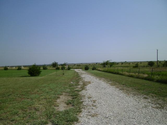 2566 County Road 2320 Decatur, TX 76234 - Photo 4 of 7 a view of a grassy area