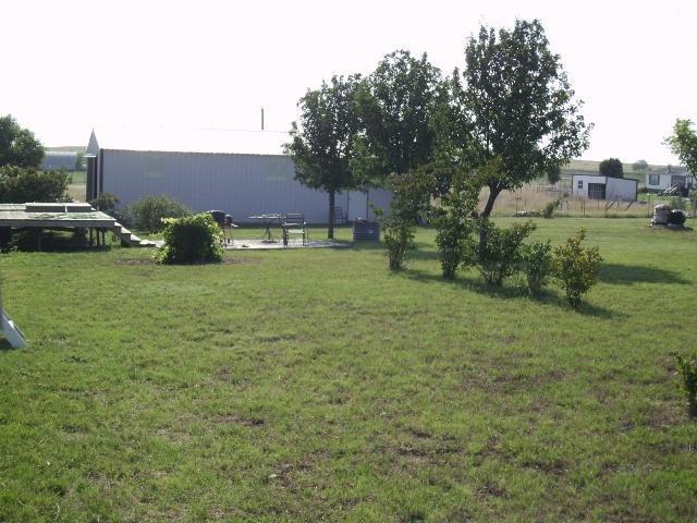 2566 County Road 2320 Decatur, TX 76234 - Photo 7 of 7 a view of a house with a yard