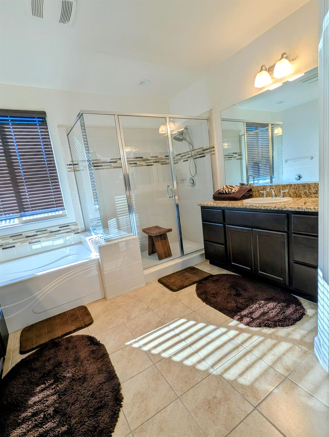 174 Emperor Way Dinuba, CA 93618 - Photo 19 of 23 a living room with furniture and a rug