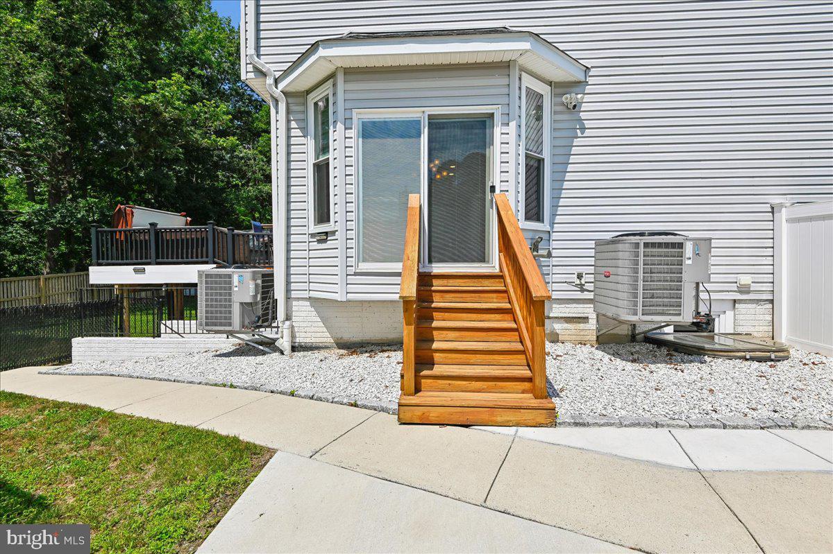 603 Queenstown Road Severn, MD 21144 - Photo 66 of 85 Charming entryway with lush greenery.
