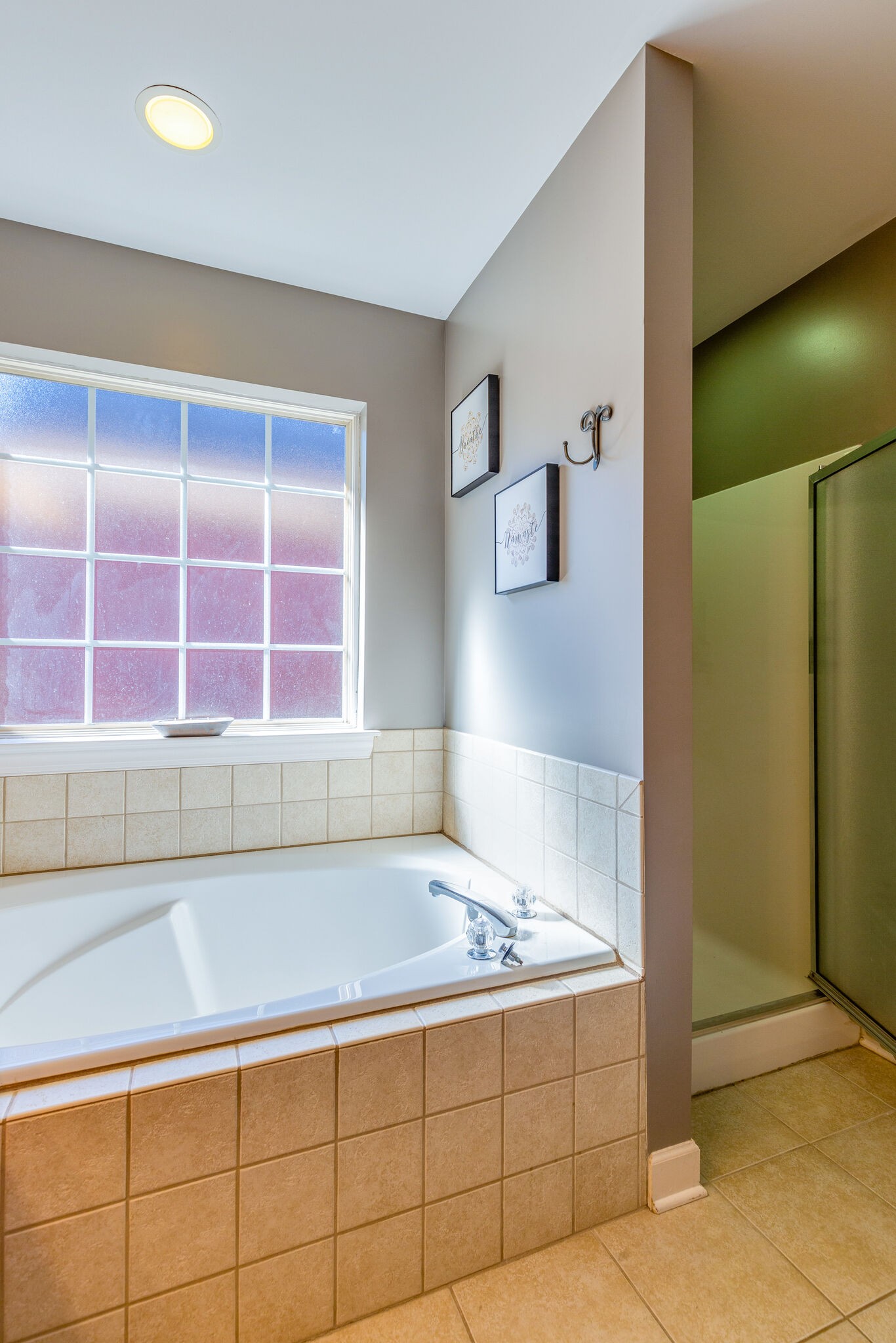 1517 Rachaels Ridge Hermitage, TN 37076 - Photo 18 of 32 a bathroom with a tub and a shower