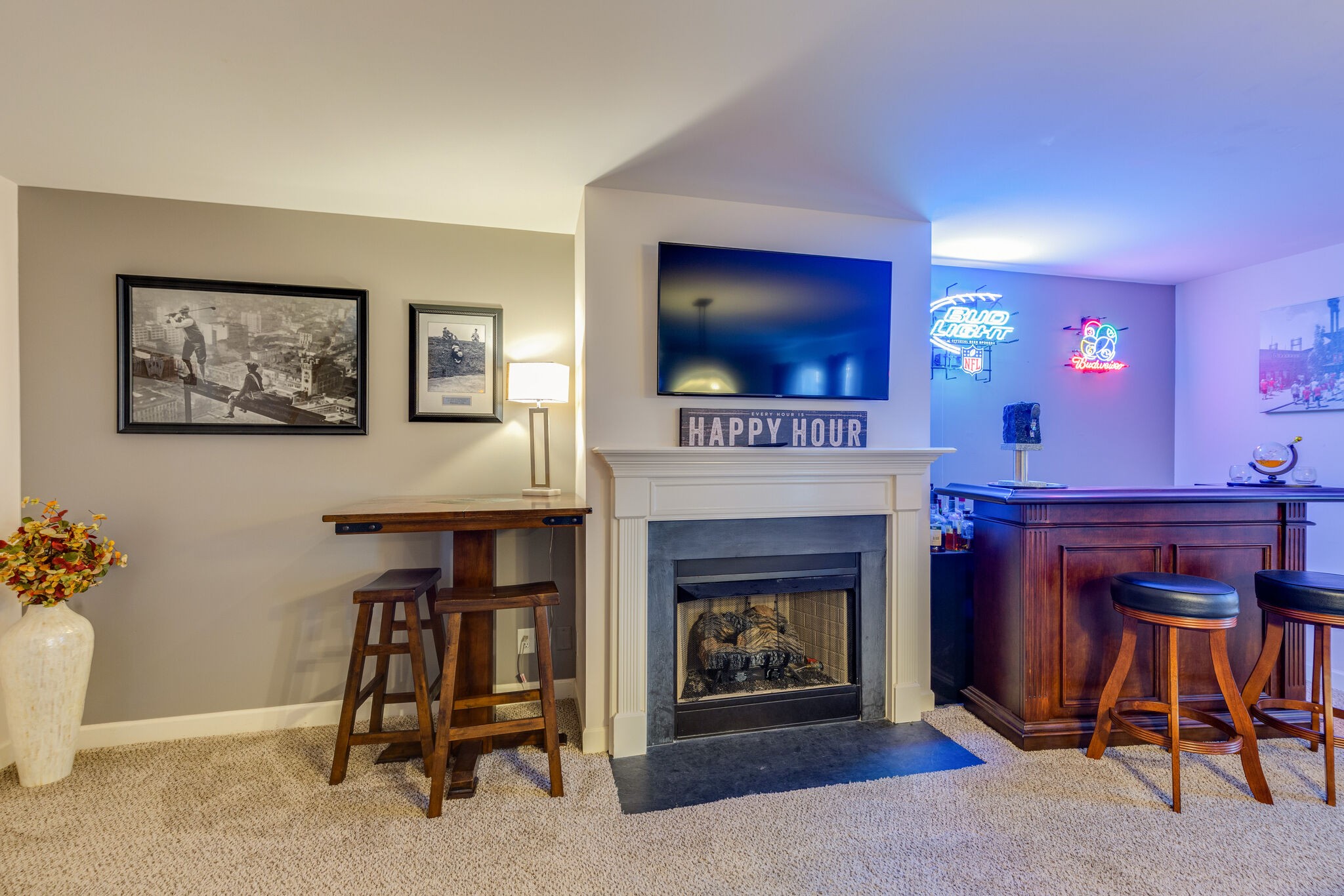 1517 Rachaels Ridge Hermitage, TN 37076 - Photo 21 of 32 a living room with furniture a flat screen tv and a fireplace