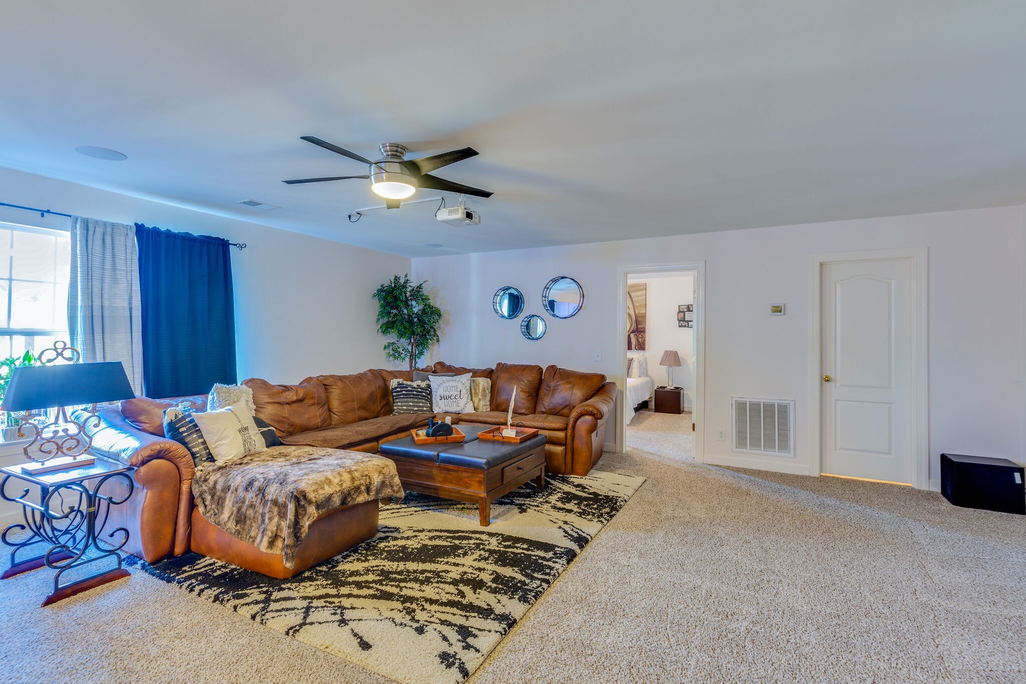 1517 Rachaels Ridge Hermitage, TN 37076 - Photo 23 of 32 a living room with furniture and a ceiling fan