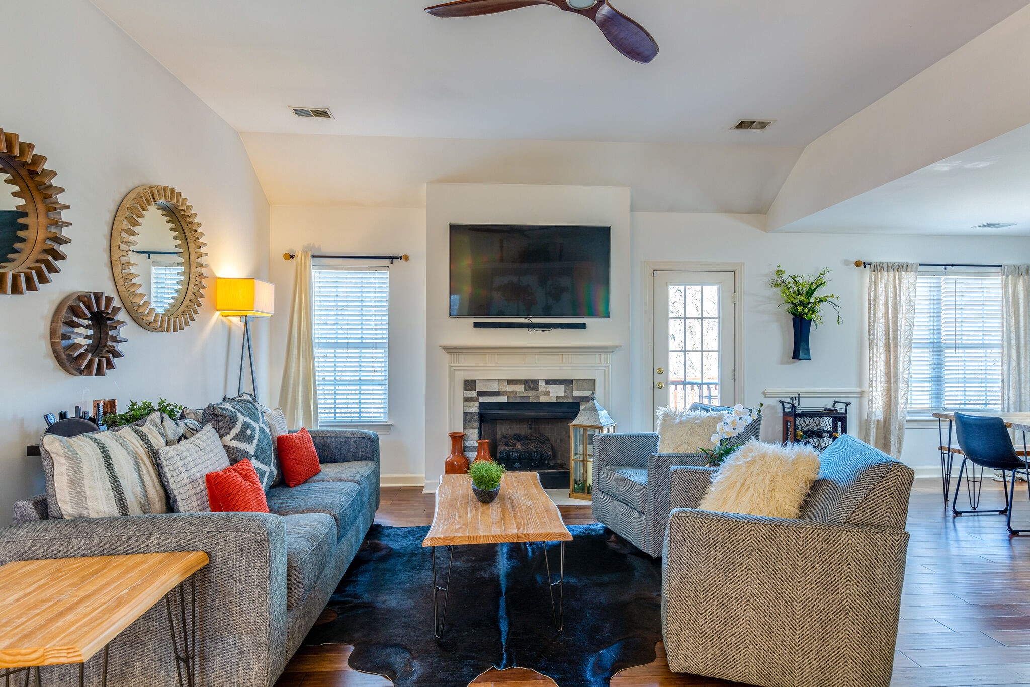 1517 Rachaels Ridge Hermitage, TN 37076 - Photo 6 of 32 a living room with furniture fireplace and a flat screen tv
