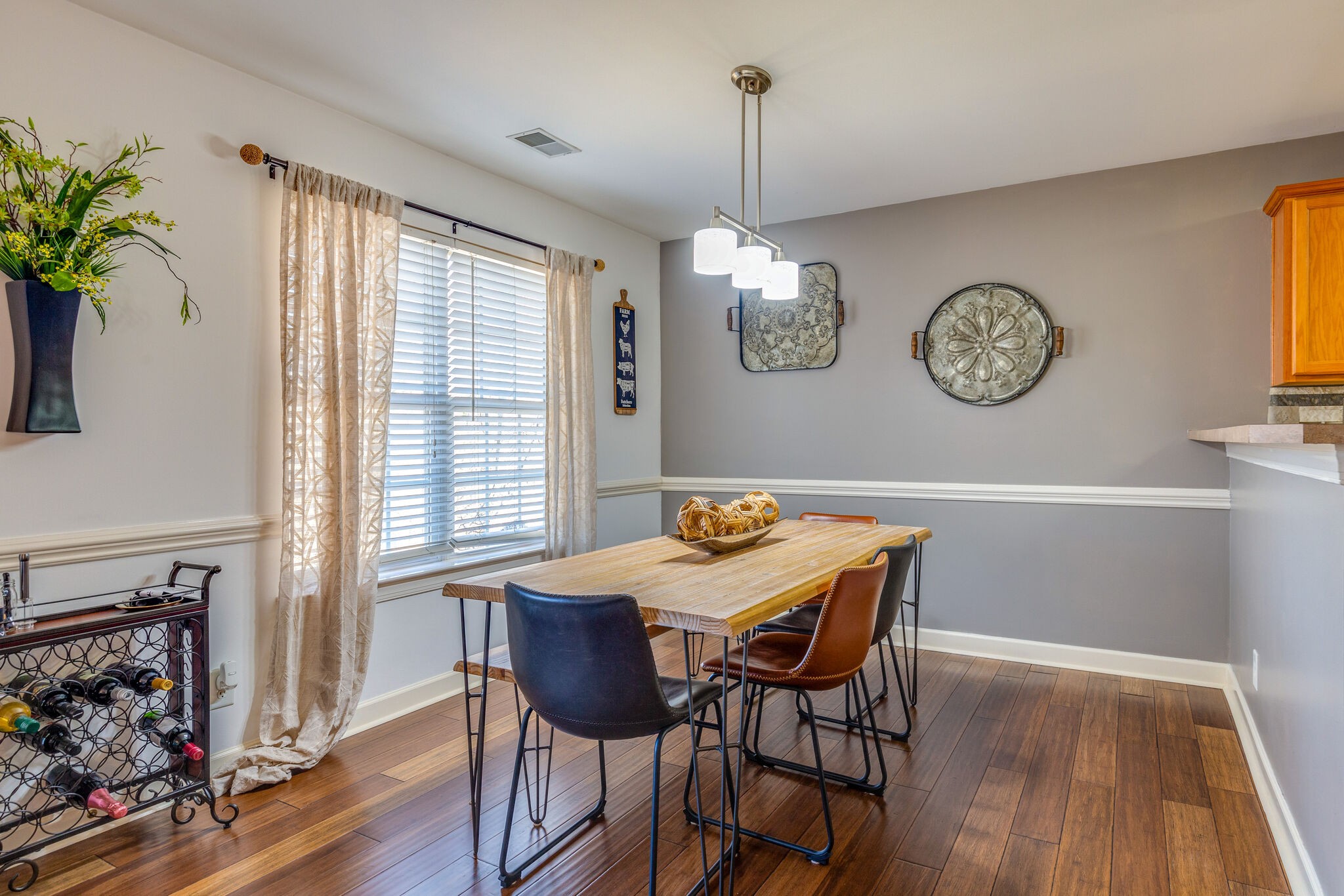 1517 Rachaels Ridge Hermitage, TN 37076 - Photo 8 of 32 a view of a dining room with furniture wooden floor and a chandelier