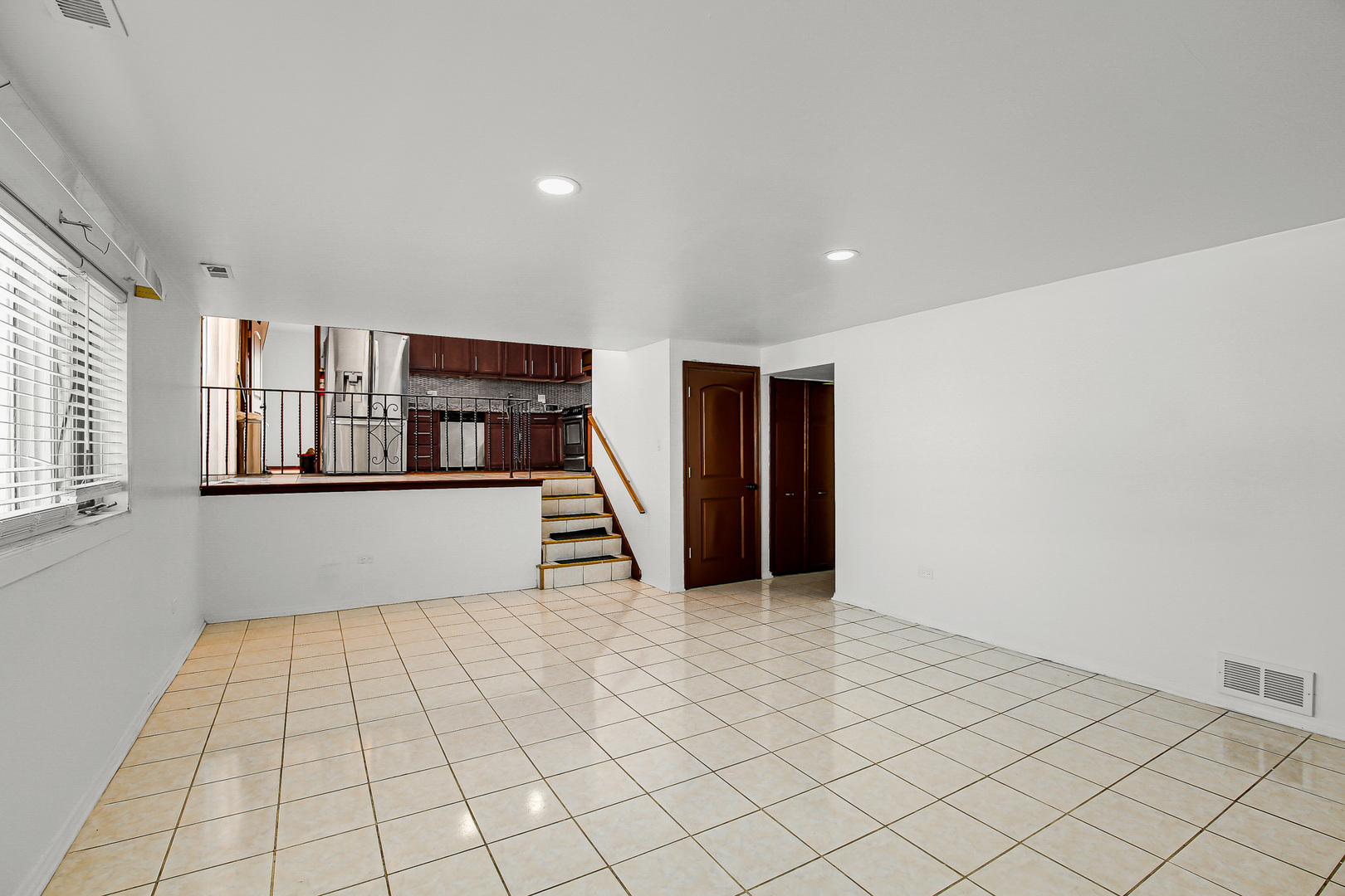8424 Currant Avenue Tinley Park, IL 60487 - Photo 9 of 23 a view of an empty room with wooden floor