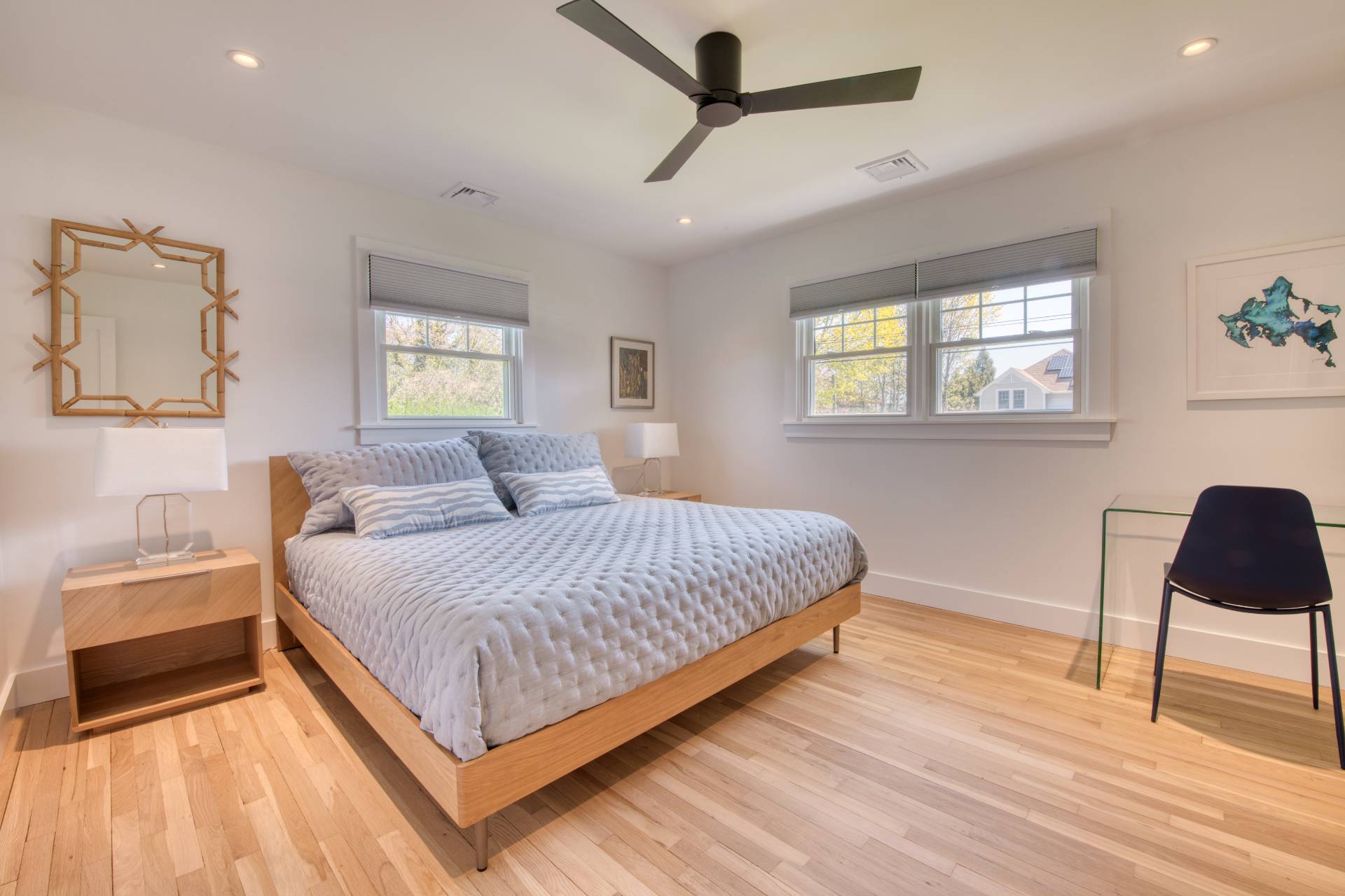 35 Ridge Drive Sag Harbor, NY 11963 - Photo 16 of 16 a bedroom with a bed and a chair
