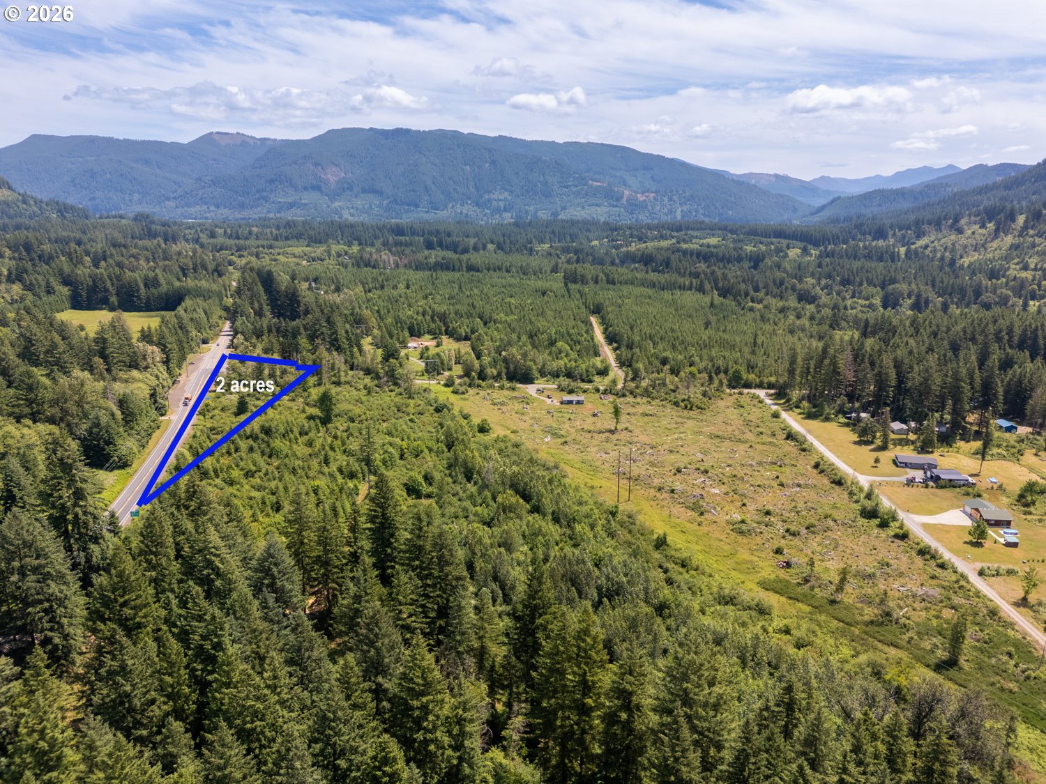 0 Lewis River Road Ariel, WA 98603 - Photo 6 of 9 a view of a lake with a mountain