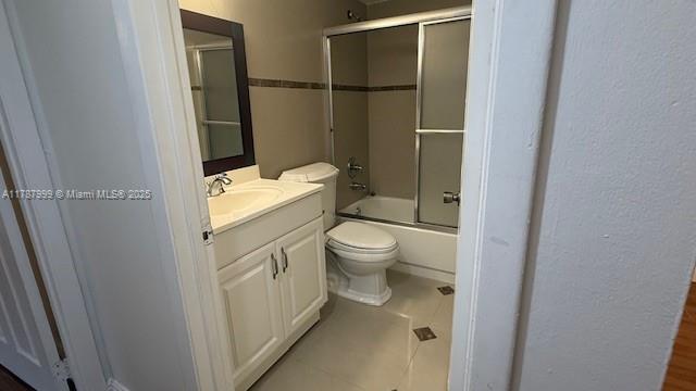 545 Trace Circle, Unit 110 Deerfield Beach, FL 33441 - Photo 14 of 20 a bathroom with a toilet and a shower