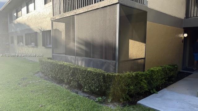 545 Trace Circle, Unit 110 Deerfield Beach, FL 33441 - Photo 17 of 20 a view of a glass door