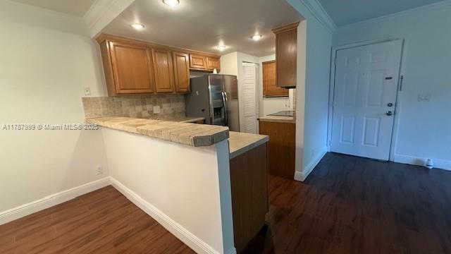545 Trace Circle, Unit 110 Deerfield Beach, FL 33441 - Photo 4 of 20 a kitchen with a refrigerator and a sink