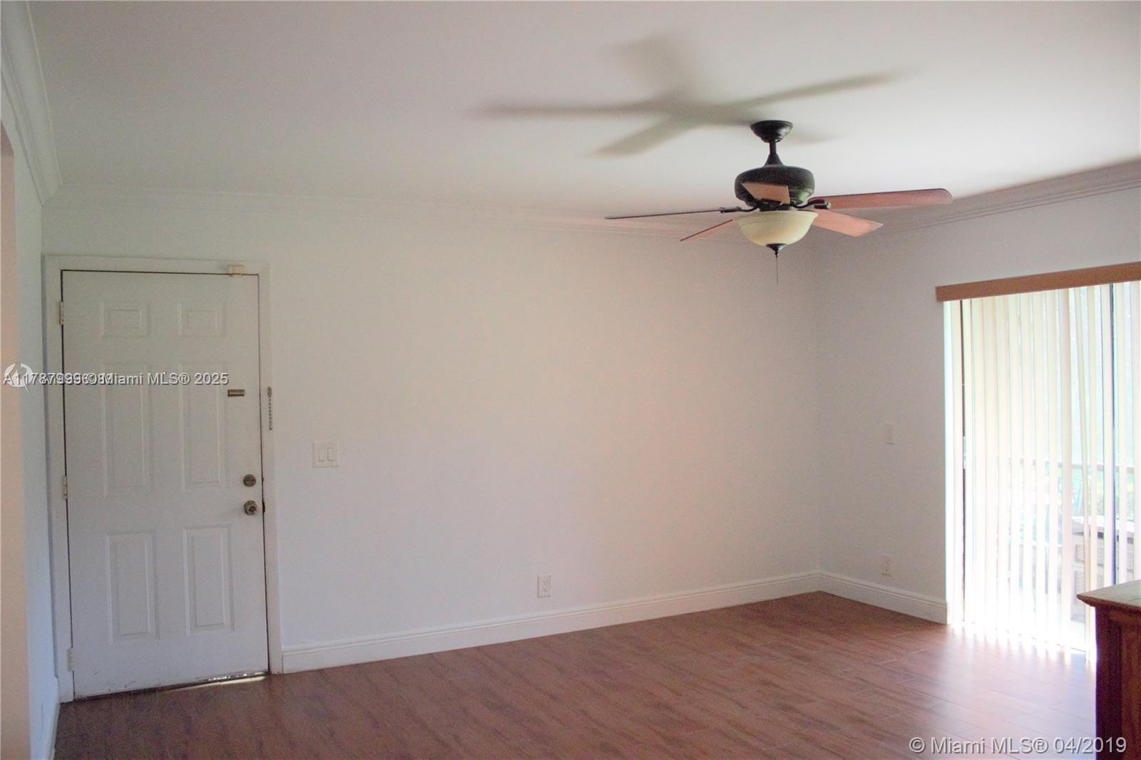 545 Trace Circle, Unit 110 Deerfield Beach, FL 33441 - Photo 10 of 20 an empty room