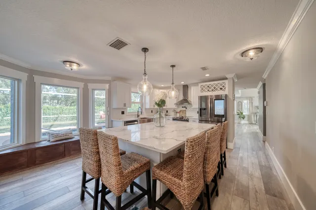 a kitchen with a stove and a sink