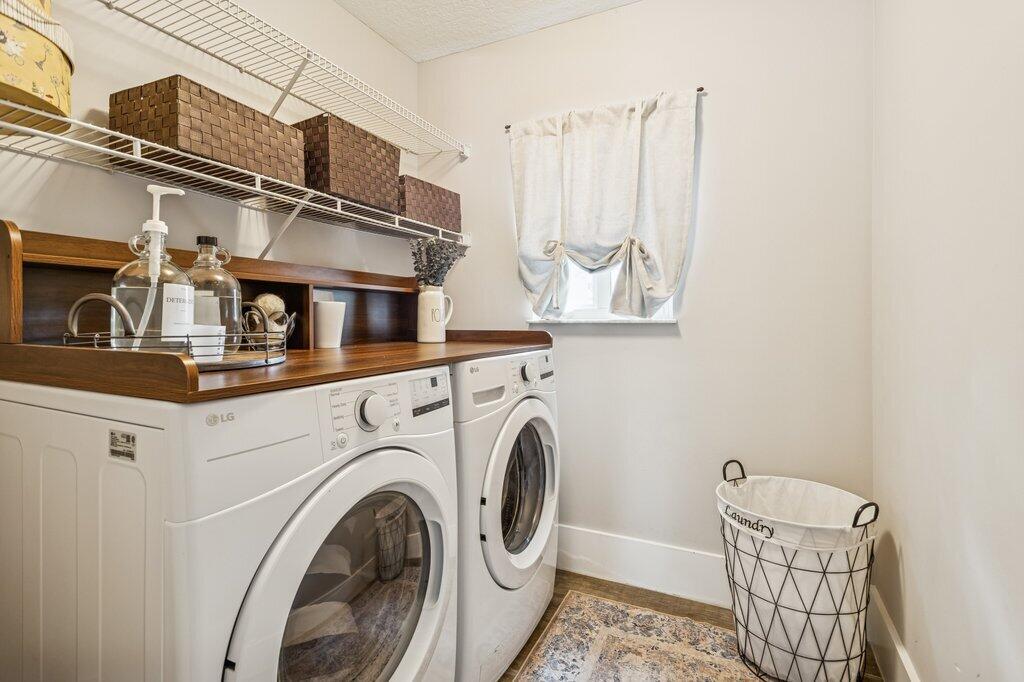20323 Monteverdi Circle Boca Raton, FL 33498 - Photo 21 of 58 a utility room with dryer and washer