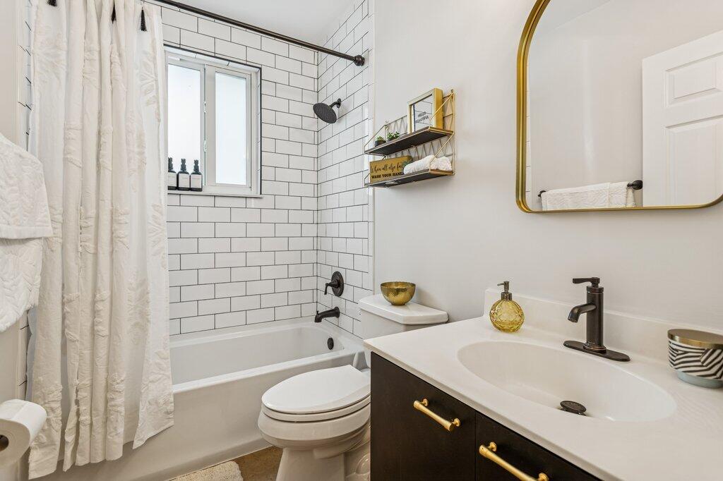 20323 Monteverdi Circle Boca Raton, FL 33498 - Photo 35 of 58 a bathroom with a sink toilet and shower