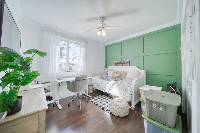 a view of a backyard with plants and patio