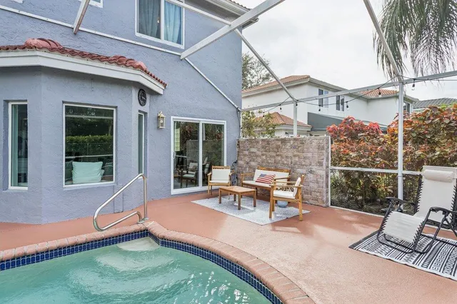a view of a swimming pool with a garden