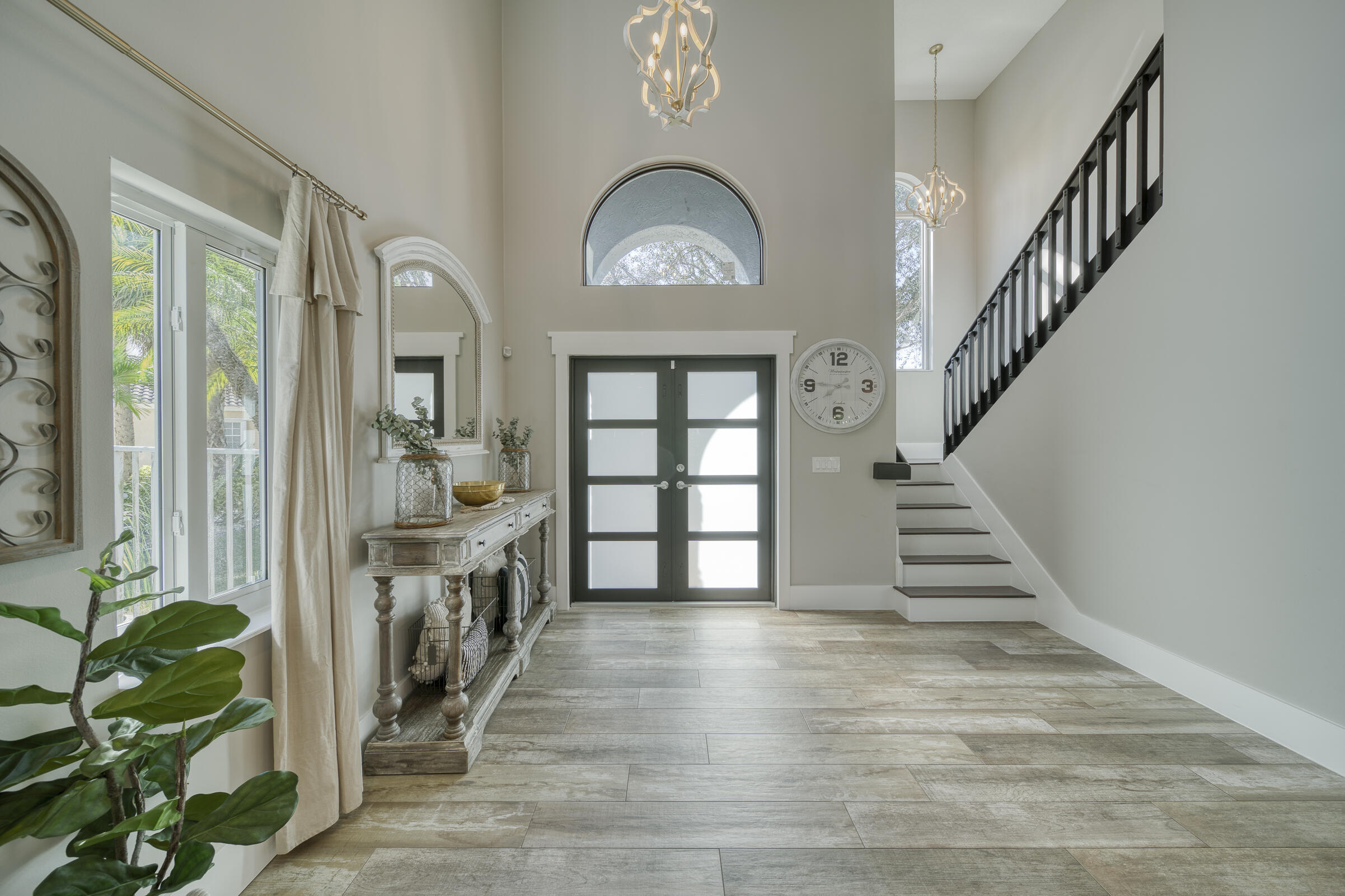 20323 Monteverdi Circle Boca Raton, FL 33498 - Photo 5 of 58 a view of an entryway with wooden floor
