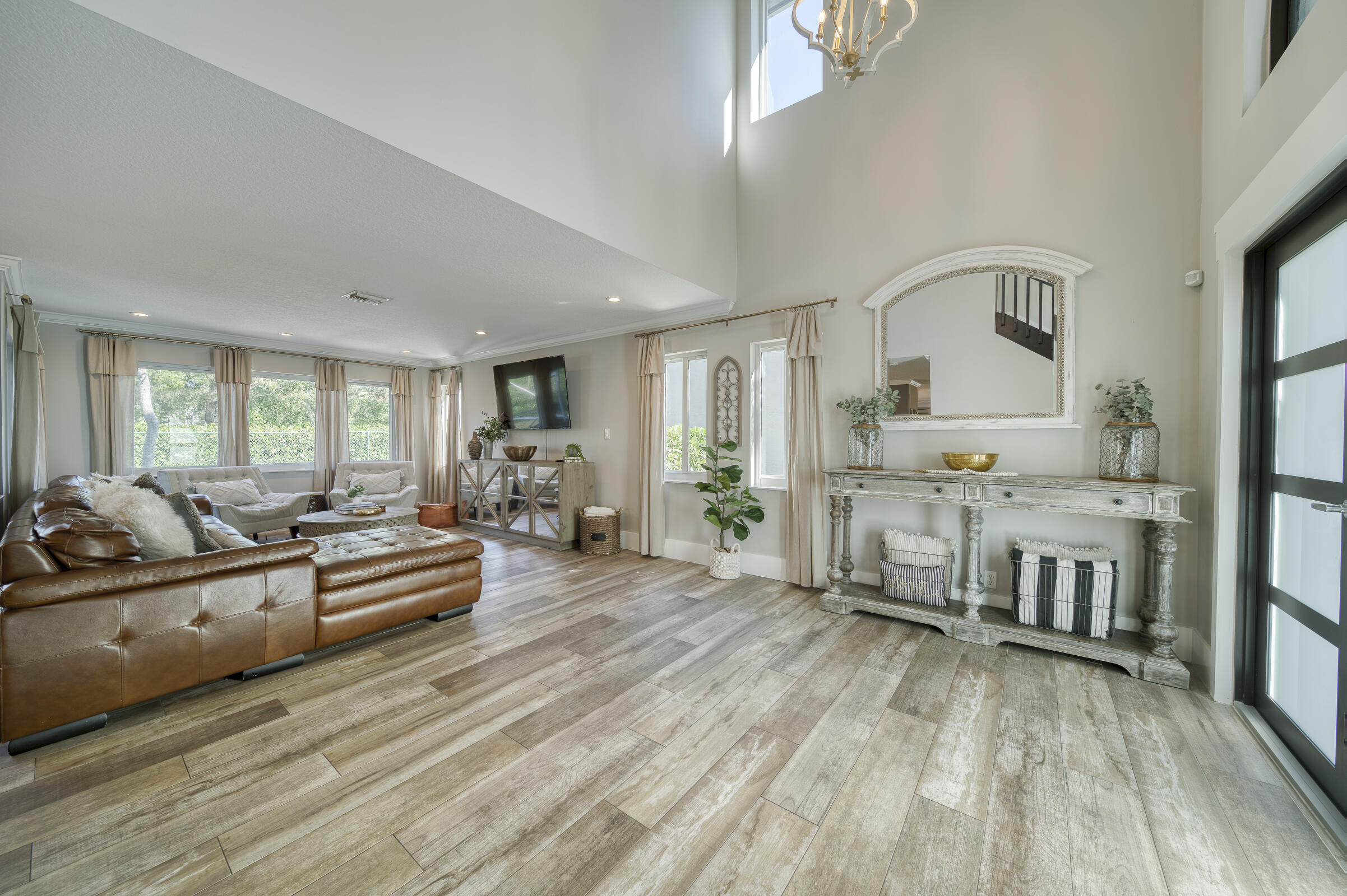 20323 Monteverdi Circle Boca Raton, FL 33498 - Photo 7 of 58 a living room with furniture and wooden floor
