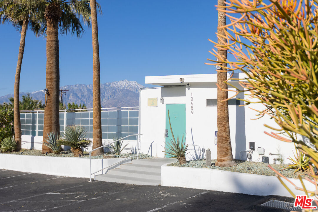 12689 Eliseo Road Desert Hot Springs, CA 92240 - Photo 5 of 28 a view of a building with a street