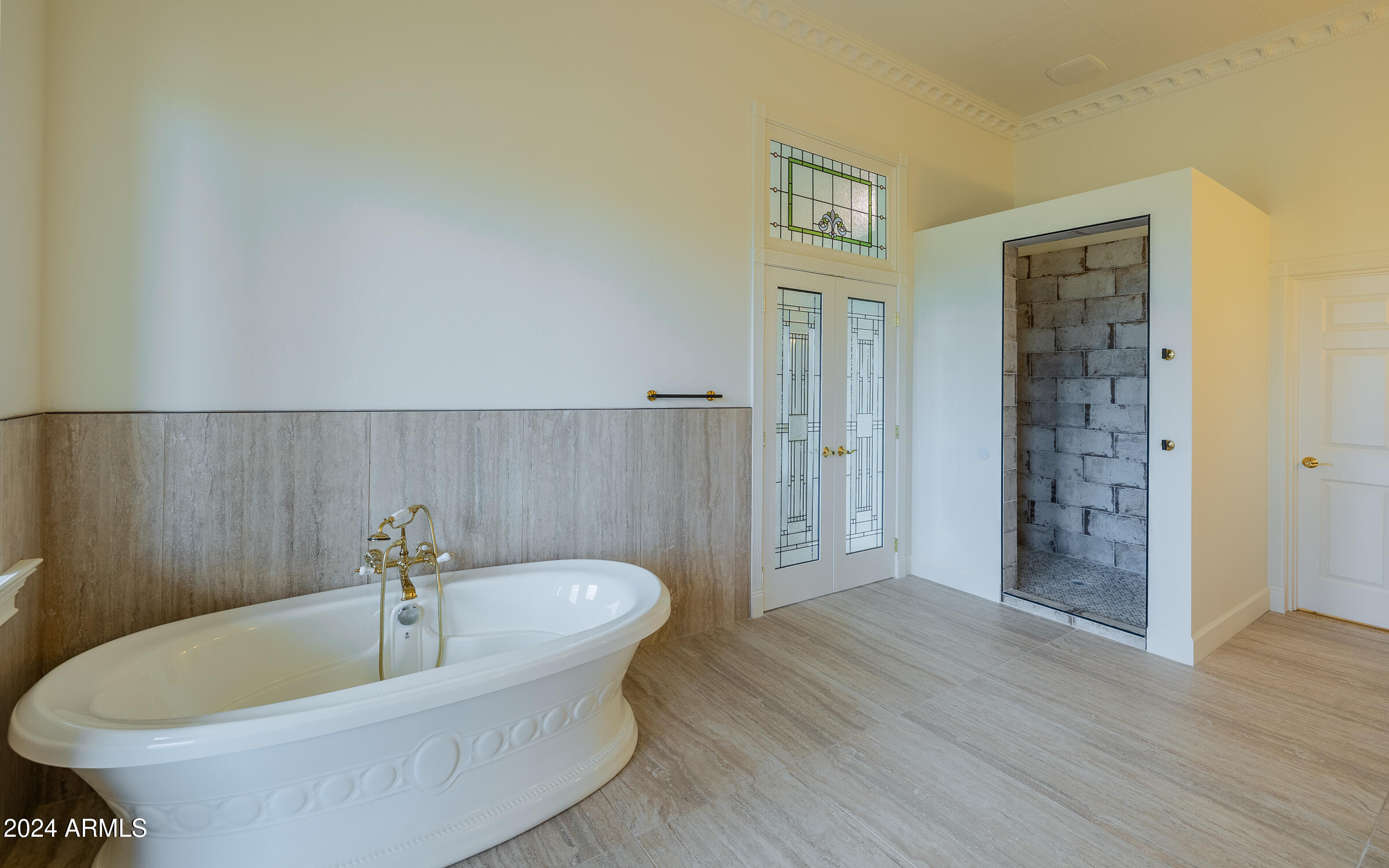 1044 North Dragoon Ranch Road St. David, AZ 85630 - Photo 16 of 57 a white bath tub sitting in a bathroom
