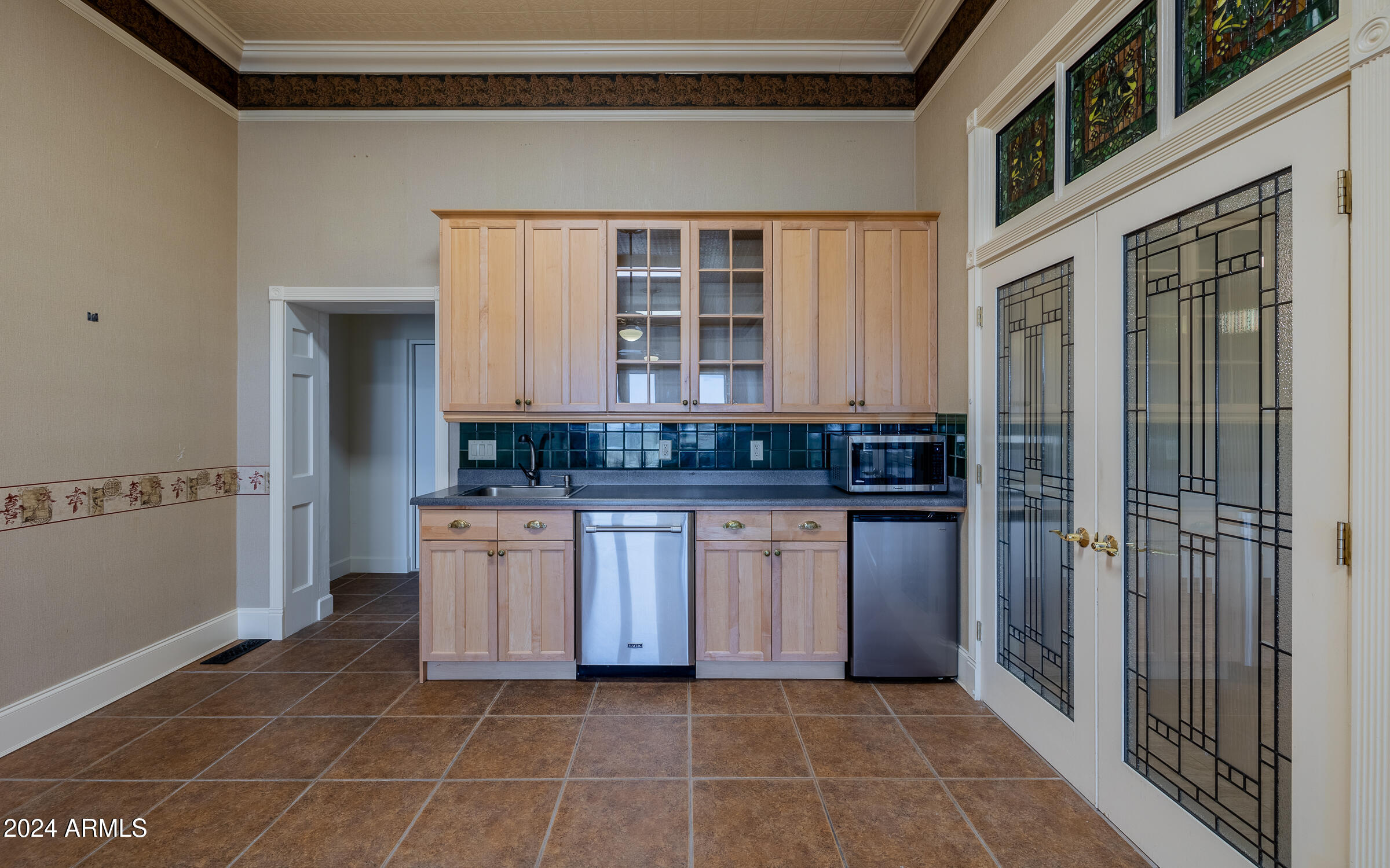 1044 North Dragoon Ranch Road St. David, AZ 85630 - Photo 20 of 57 a bathroom with a granite countertop sink a mirror and a vanity