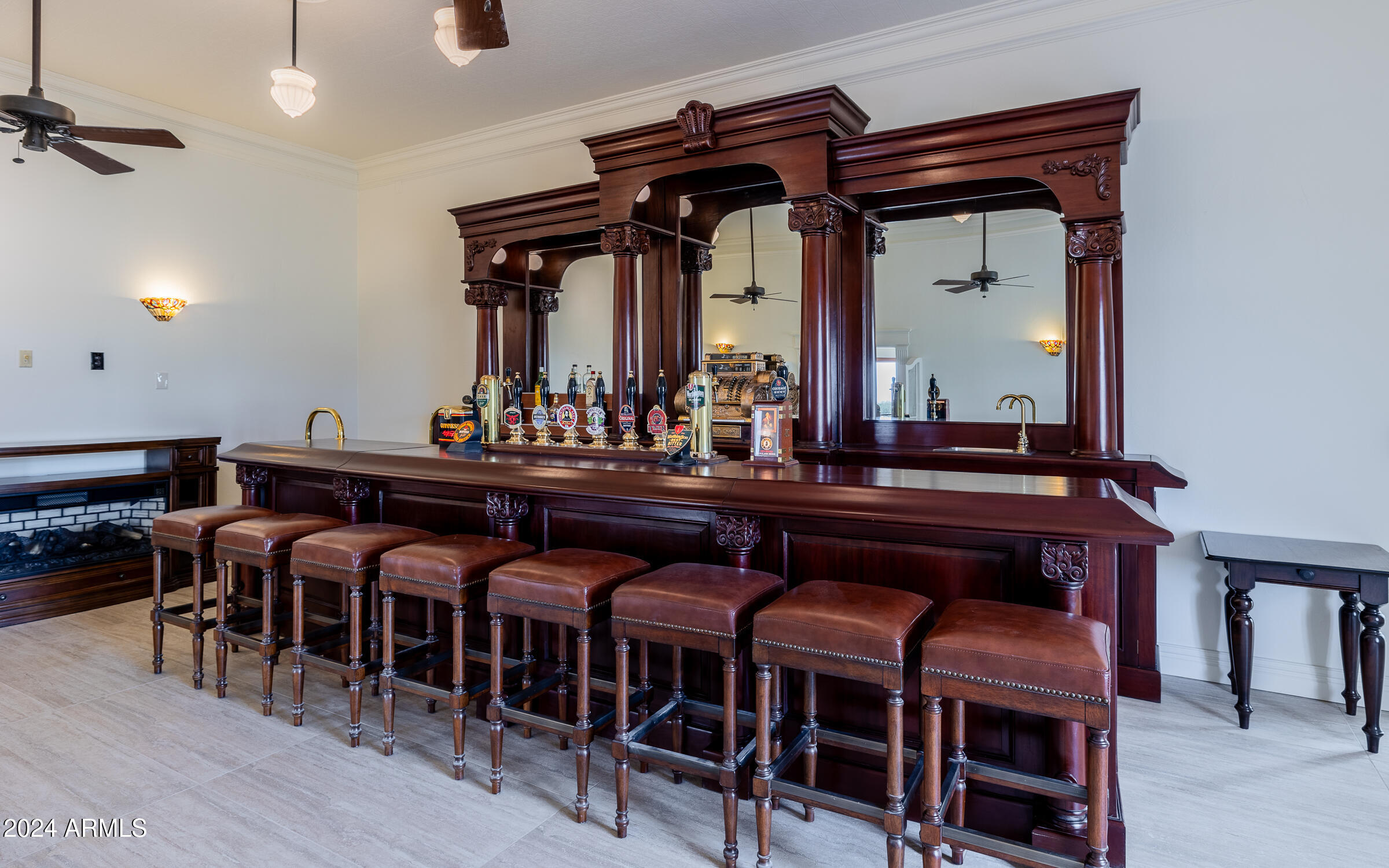 1044 North Dragoon Ranch Road St. David, AZ 85630 - Photo 27 of 57 a view of a dining room with furniture and chandelier