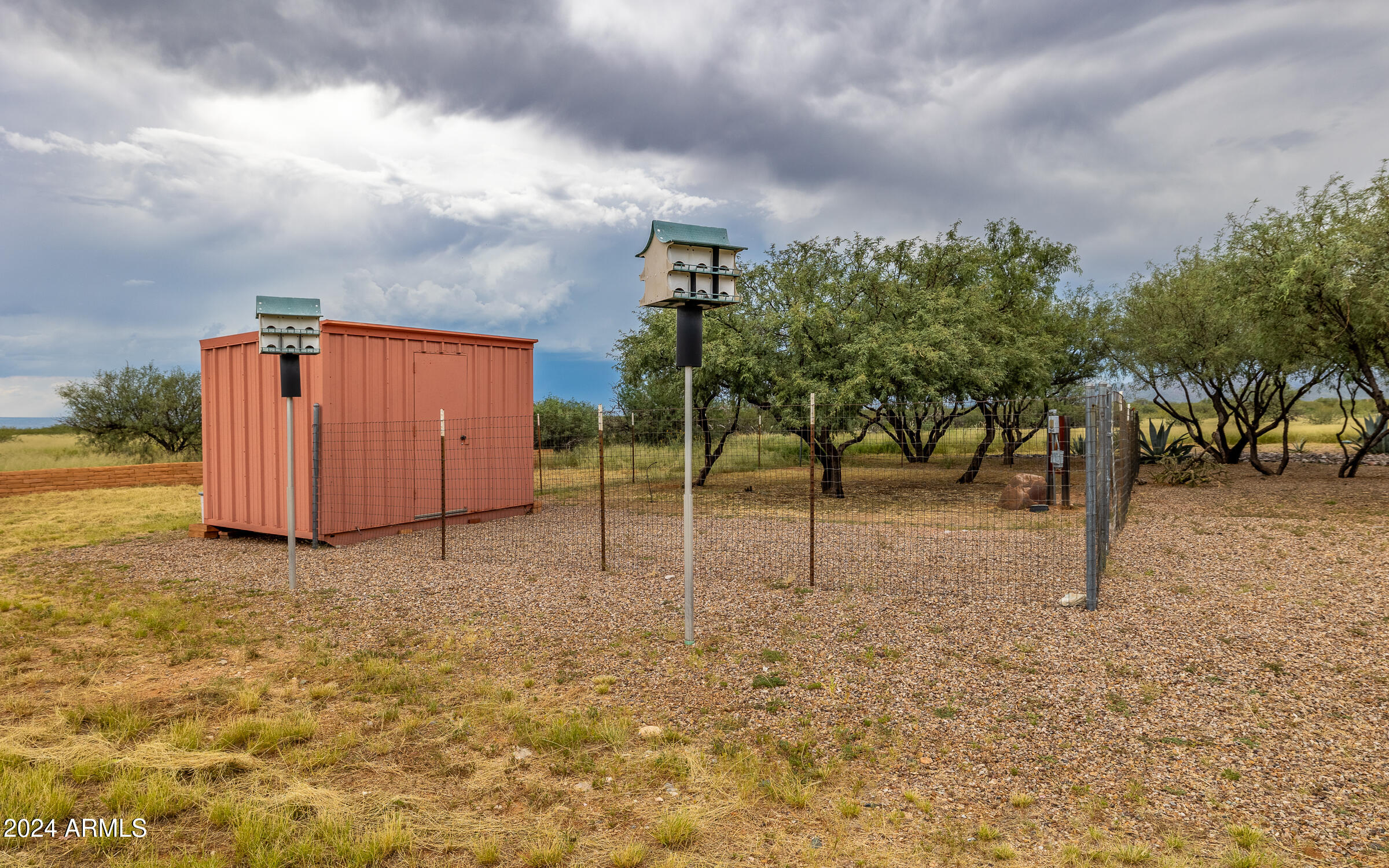 1044 North Dragoon Ranch Road St. David, AZ 85630 - Photo 39 of 57 a backyard of a house with lots of green space