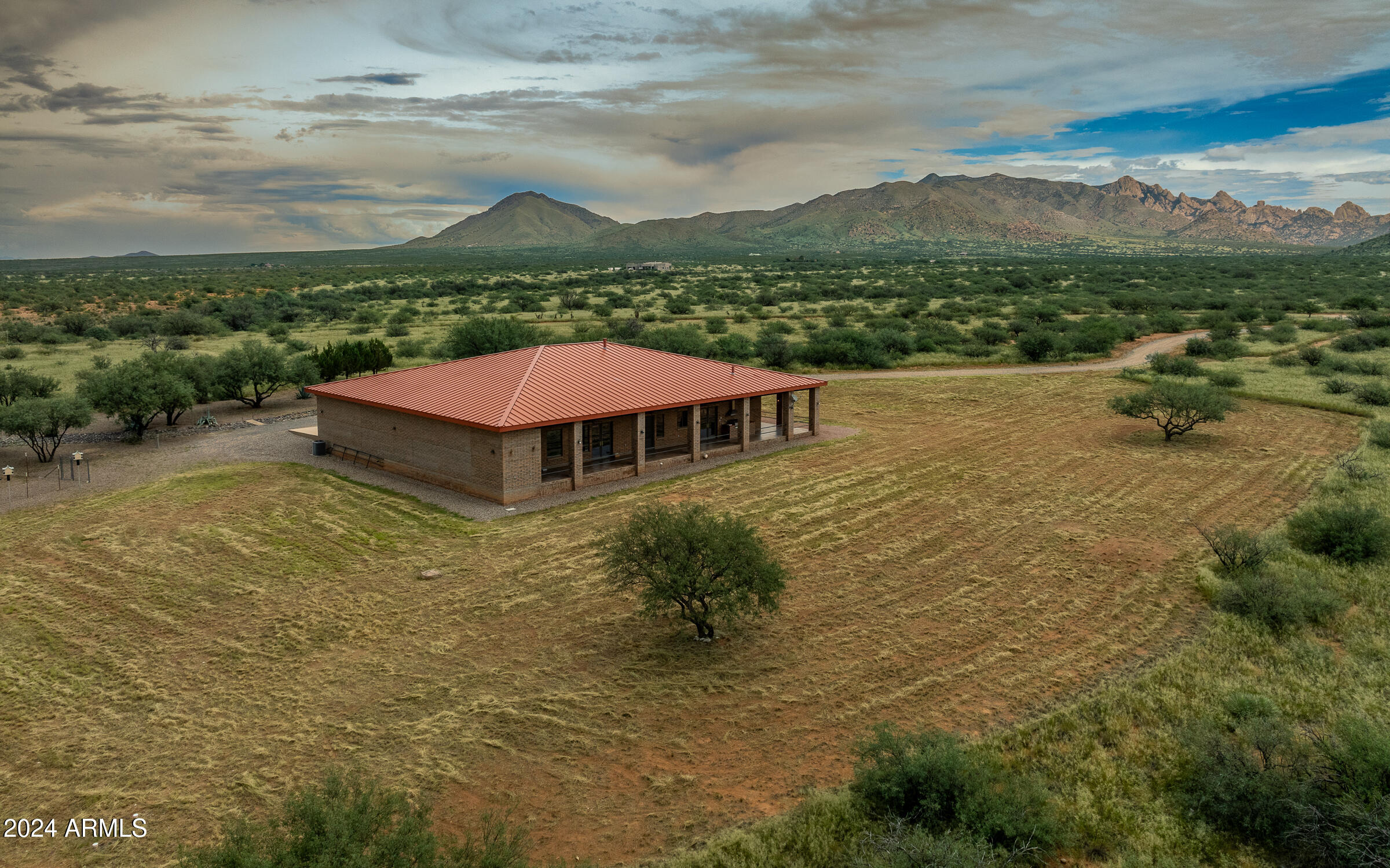 1044 North Dragoon Ranch Road St. David, AZ 85630 - Photo 49 of 57 a view of a house with a yard
