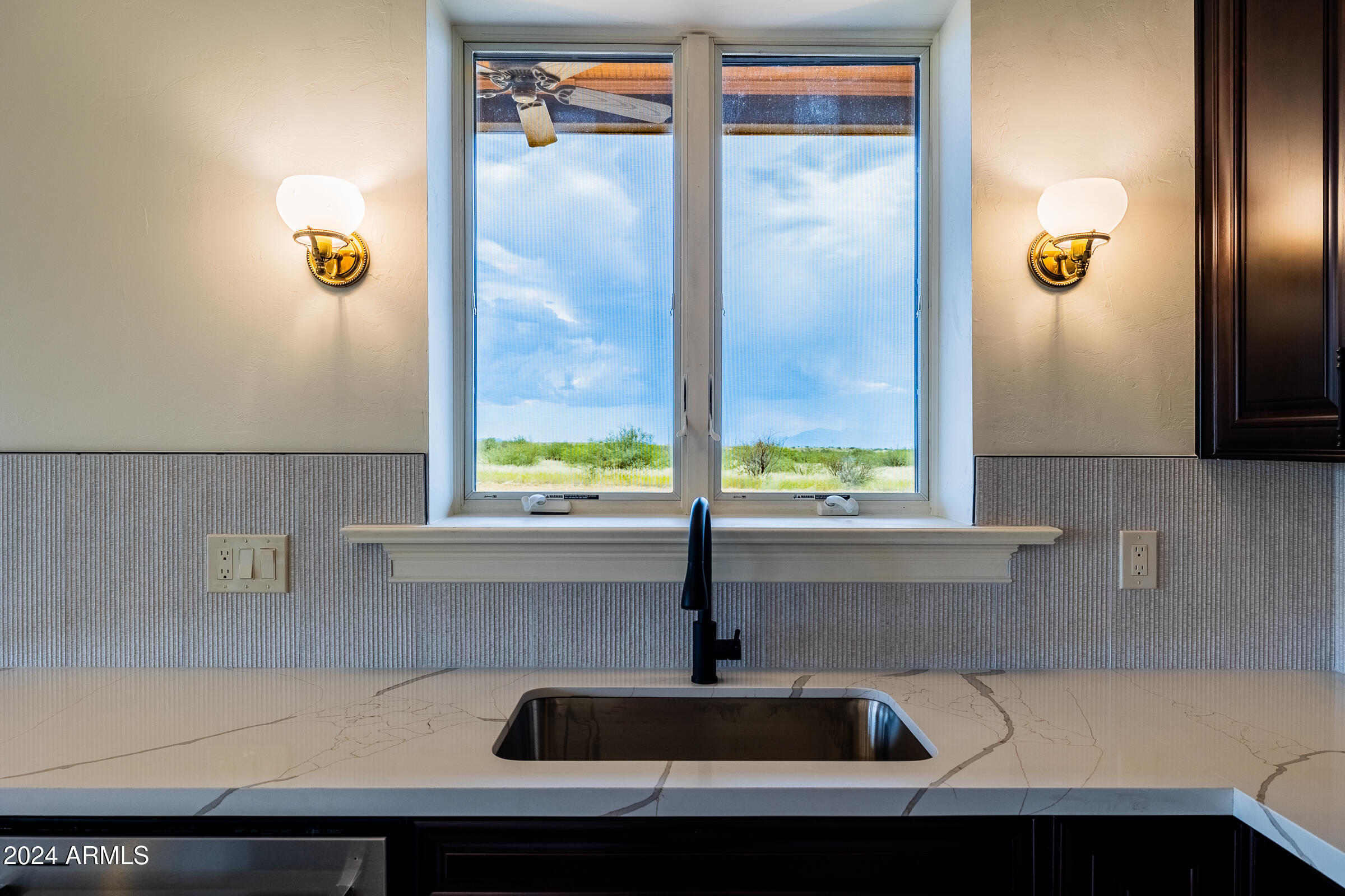 1044 North Dragoon Ranch Road St. David, AZ 85630 - Photo 7 of 57 a bathroom with a sink and a mirror