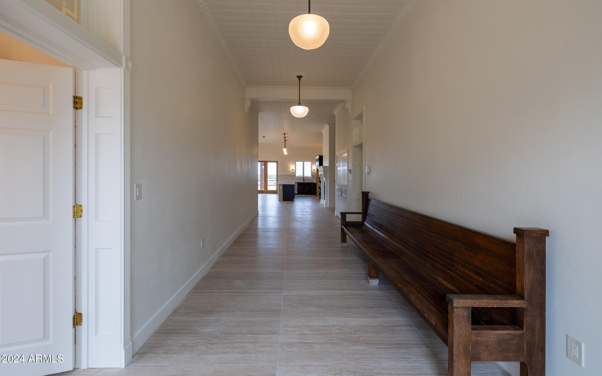 1044 North Dragoon Ranch Road St. David, AZ 85630 - Photo 9 of 57 a view of a hallway with wooden floor