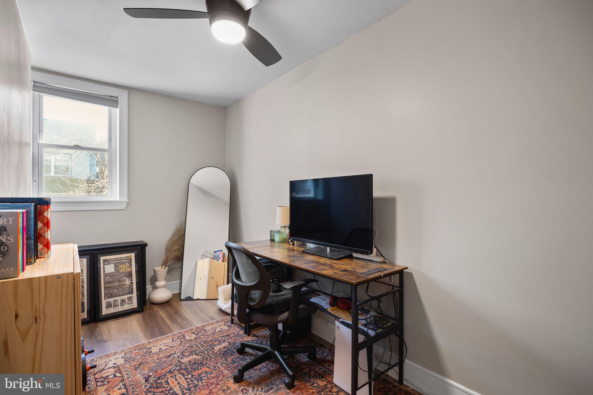 3743 Sharp Street Philadelphia, PA 19127 - Photo 17 of 25 a view of a workspace with furniture and a window
