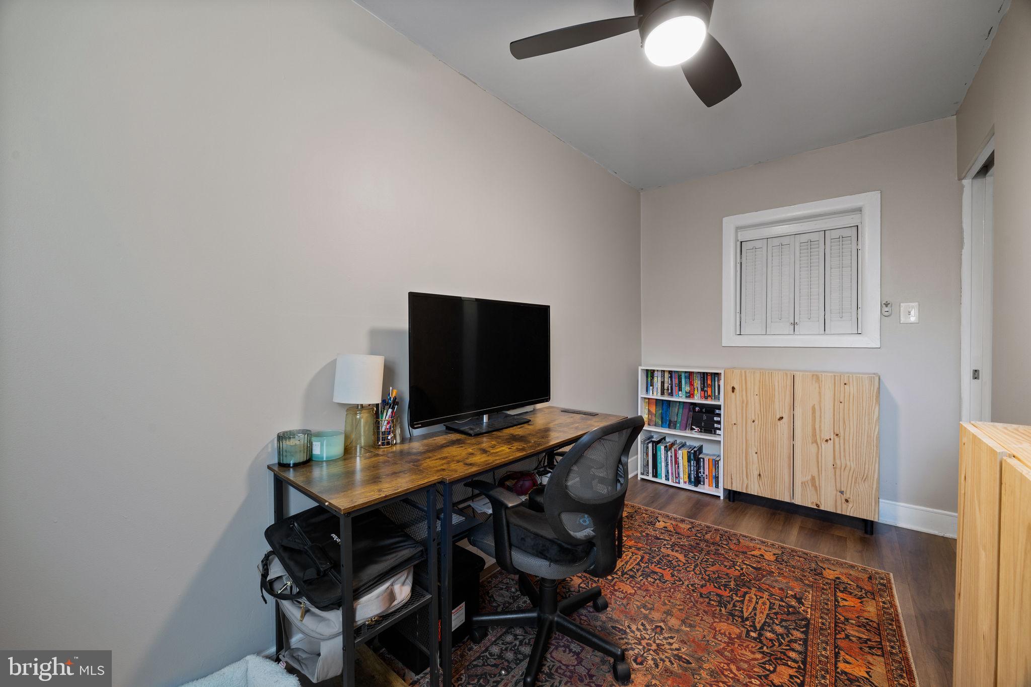3743 Sharp Street Philadelphia, PA 19127 - Photo 18 of 25 a view of a workspace with furniture and wooden floor