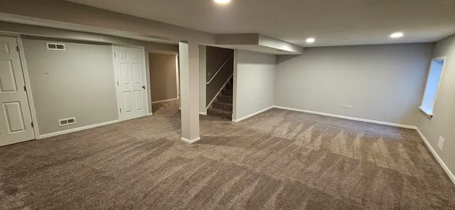 an empty room with a natural light