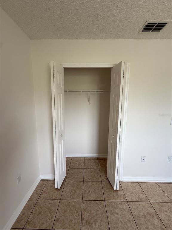 2744 Botts Landing Road, Unit 204 DeLand, FL 32720 - Photo 15 of 19 a view of a hallway to rooms