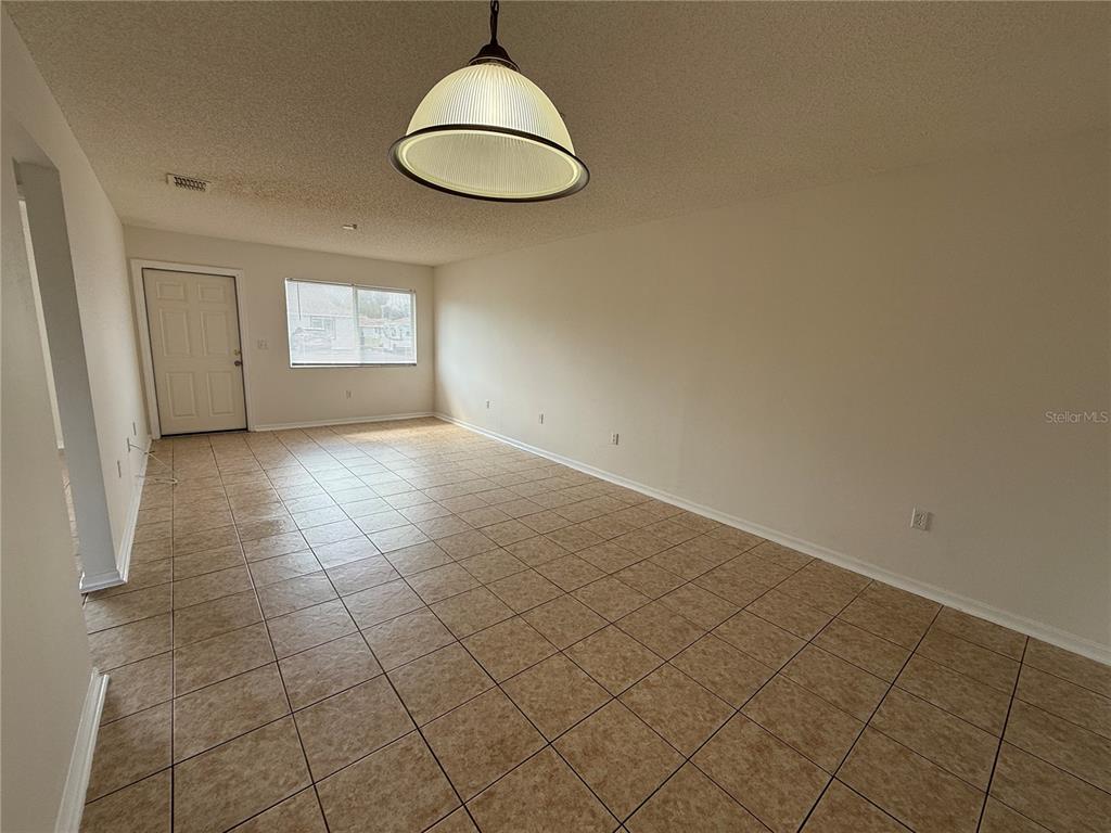 2744 Botts Landing Road, Unit 204 DeLand, FL 32720 - Photo 6 of 19 an empty room with a window