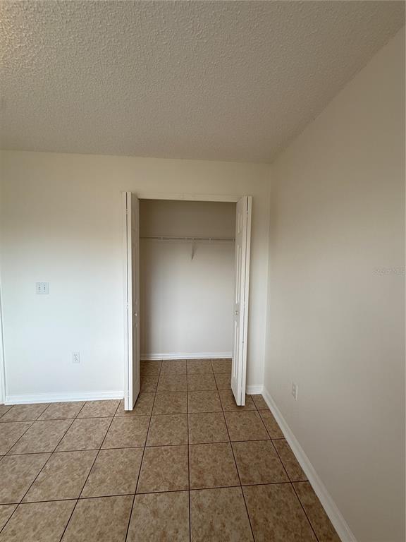 2744 Botts Landing Road, Unit 204 DeLand, FL 32720 - Photo 10 of 19 a view of an empty room and window