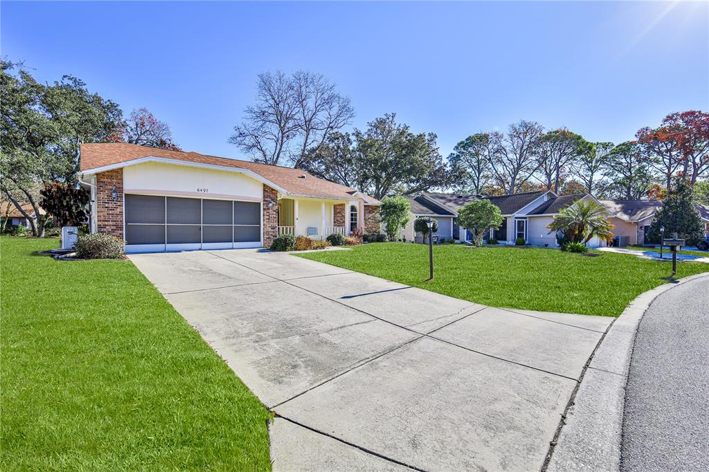 6497 Pine Meadows Drive Spring Hill, FL 34606 - Photo 3 of 52