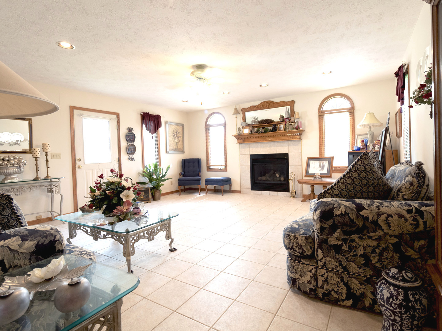 6240 Gun Club Road Morris, IL 60450 - Photo 8 of 19 a living room with furniture fireplace and flat screen tv