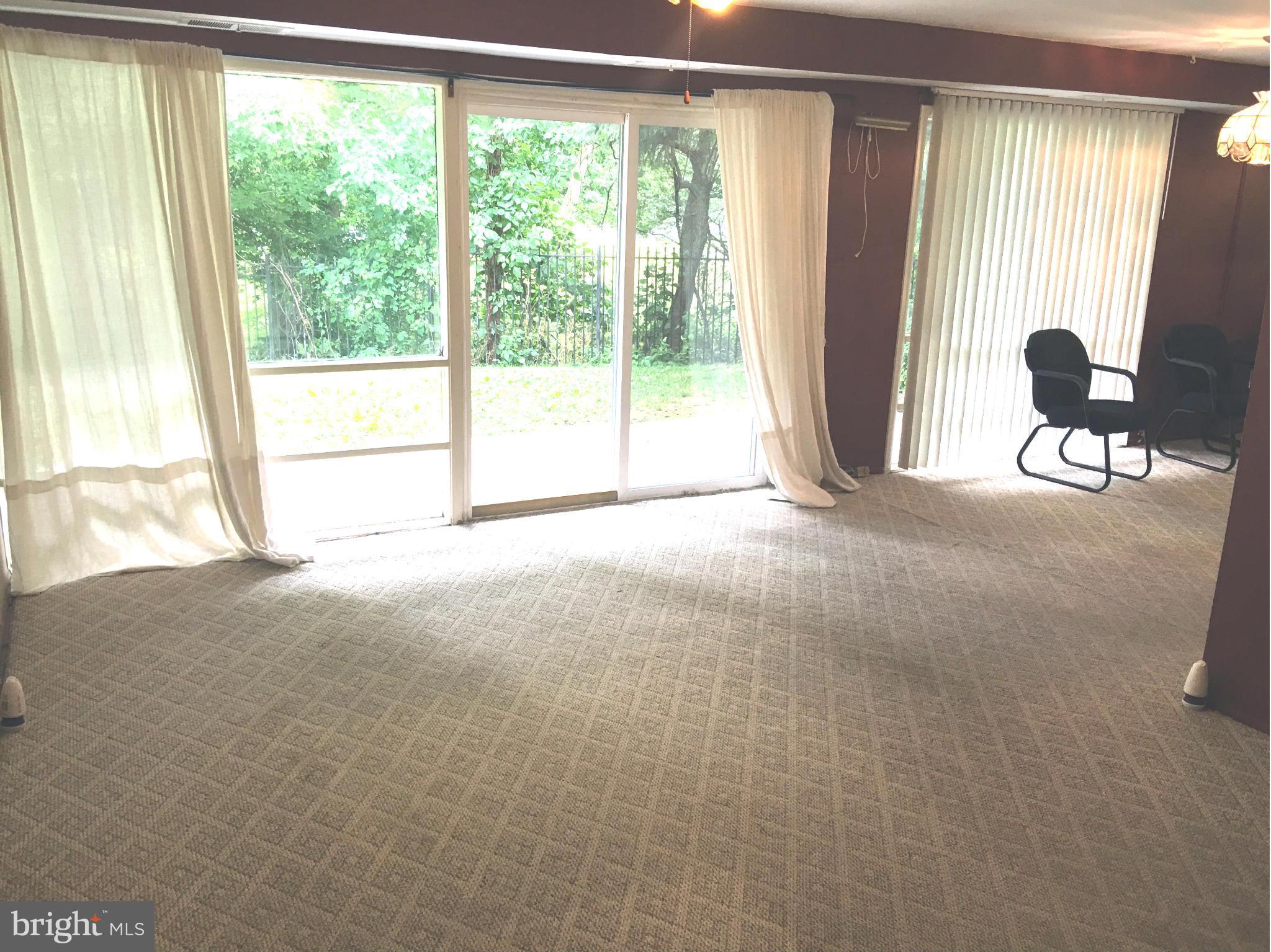 9270 Adelphi Road, Unit 103 Hyattsville, MD 20783 - Photo 2 of 14 a view of a room with a window