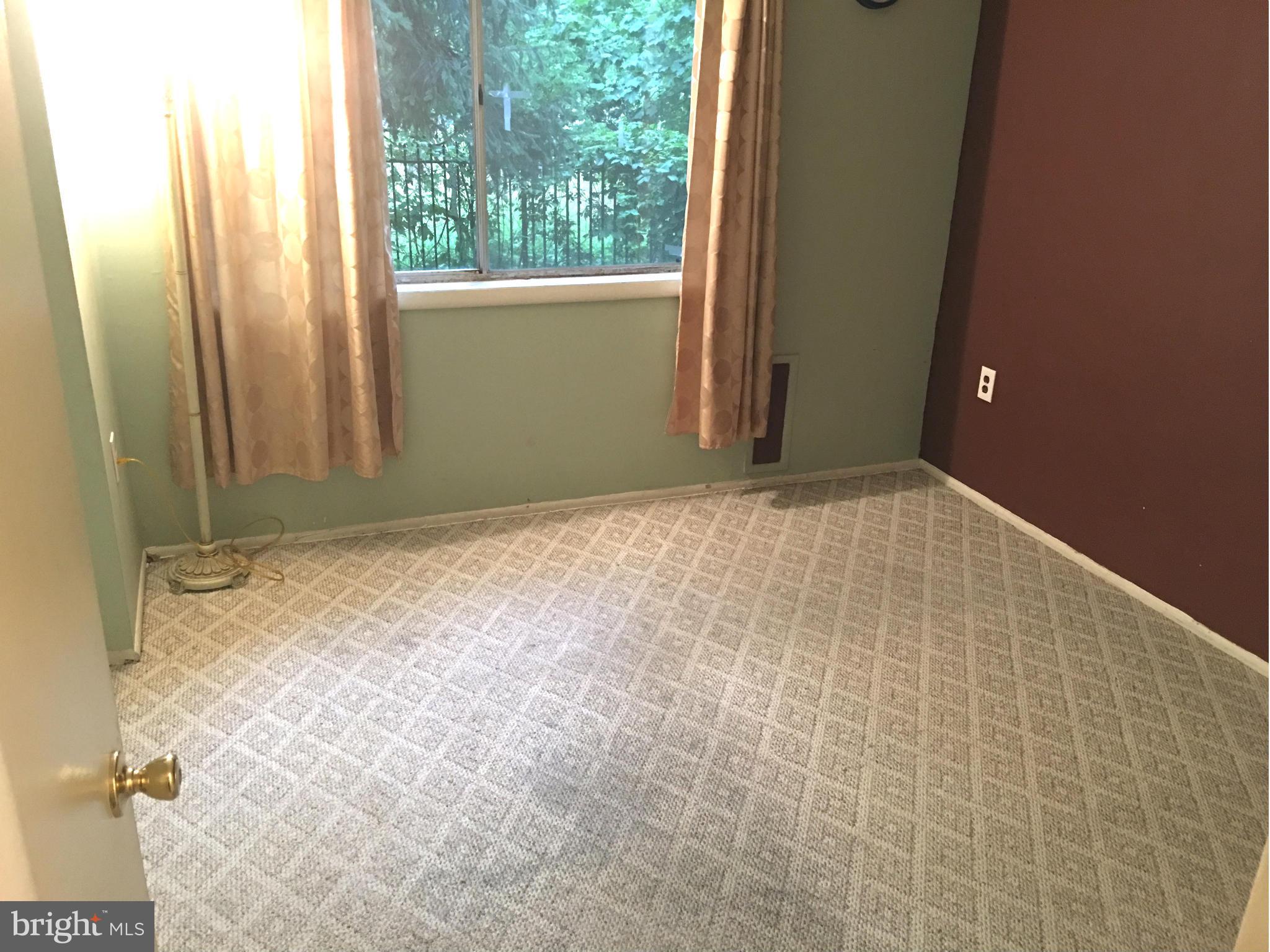 9270 Adelphi Road, Unit 103 Hyattsville, MD 20783 - Photo 14 of 14 a view of empty room with window