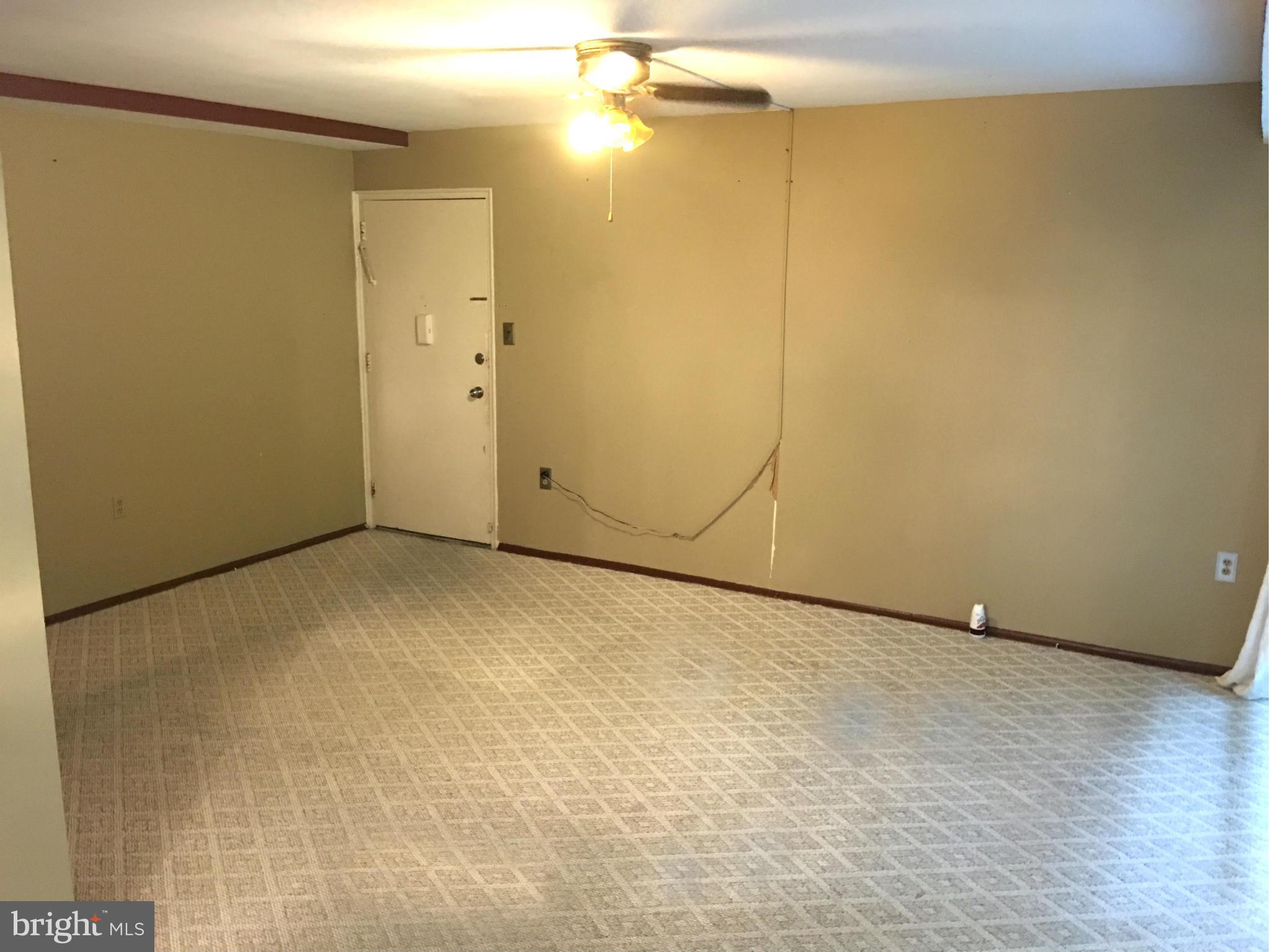 9270 Adelphi Road, Unit 103 Hyattsville, MD 20783 - Photo 4 of 14 a view of empty room